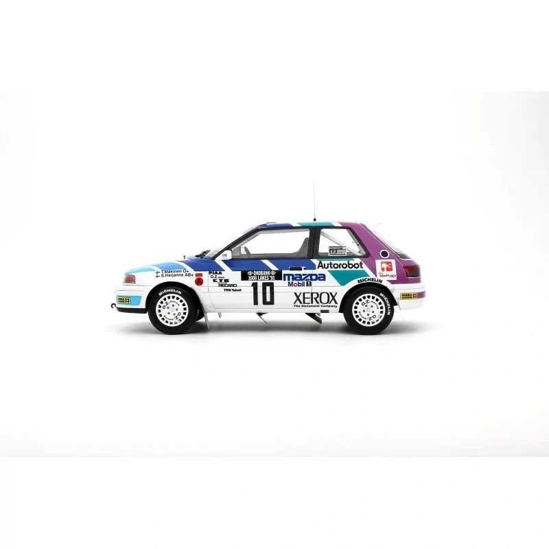 OTTOMOBILE 1:18 - Mazda 323 GTX #10 5° Rallye 1000 Lakes 1991 Mäkinen-Harjanne